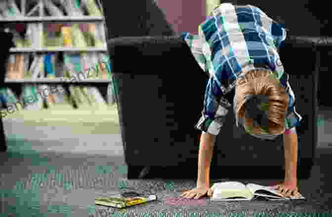 A Young Child Sitting On A Swing, Engrossed In Reading The Book I Am The Shark Joan Holub